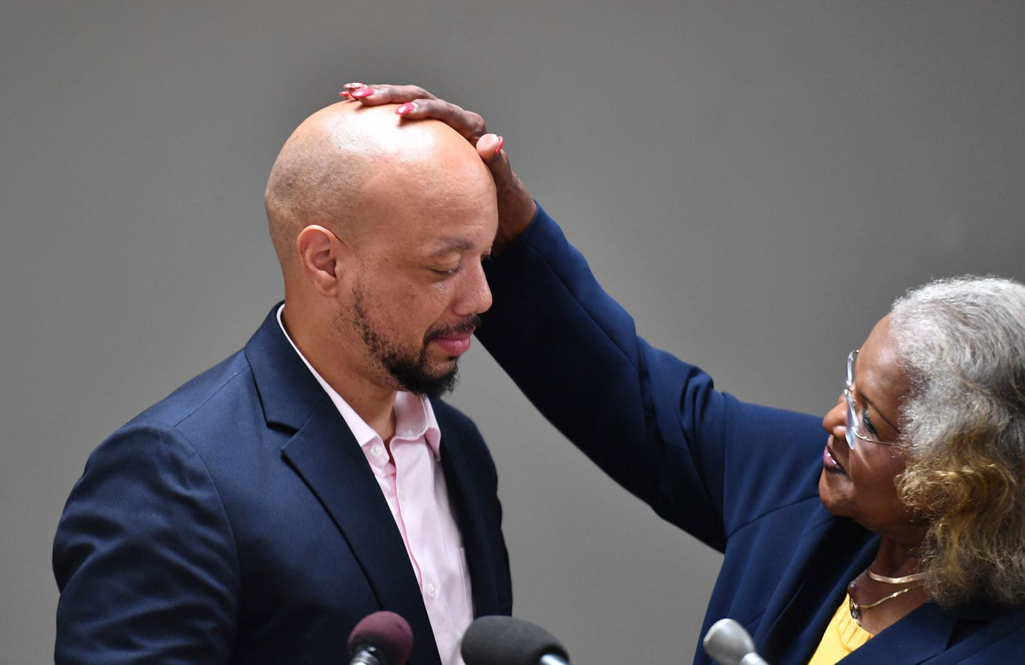 Maryland state Sen. Joanne C. Benson (D-Prince George’s) gives Curtis Brooks, her former pupil, a pat on the head as he returns to Maryland after serving 24 years in prison in Colorado. (Marvin Joseph/The Washington Post)